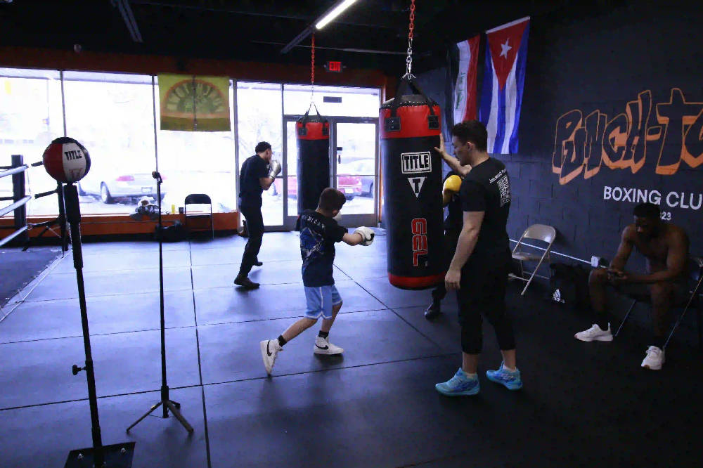 boxers training at the gym